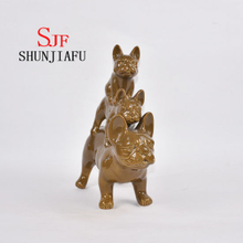 Familia armoniosa de cerámica de tres perros para decoraciones del hogar