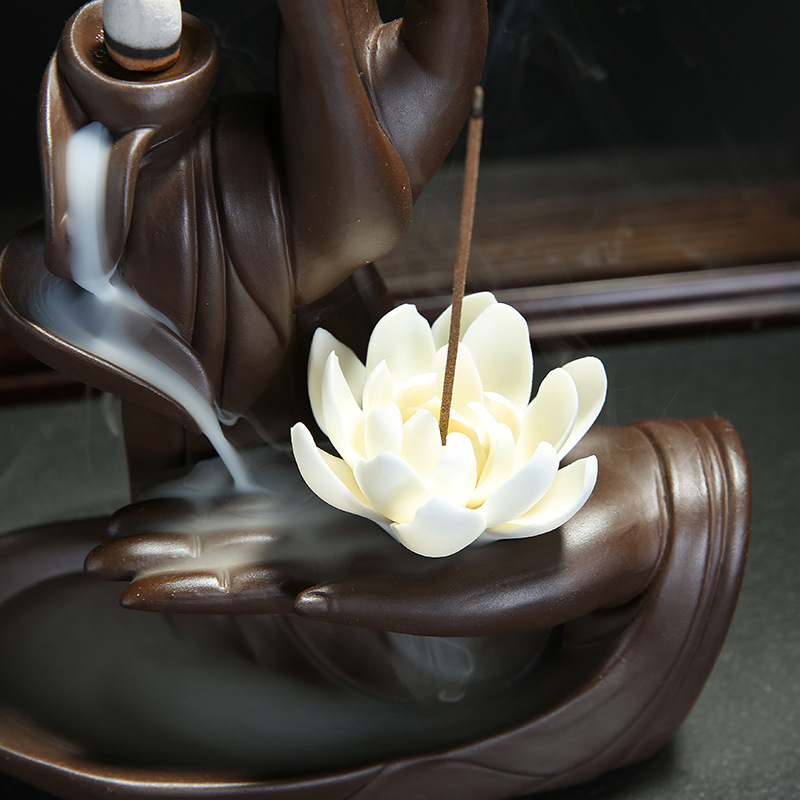 Cerámica Buda's-mano sosteniendo flores cascada retorno de incienso incienso
