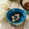 Alimentador de cerámica circular azul para mascotas