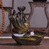 Quemador de incienso de reflujo cerámico de mano de Buda
