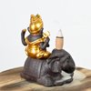 Cerámica Ganesha Play Flaute Estilo se sienta en la cascada de elefante Conejo de incienso de incienso Cerámico Cerámica Incienso incienso