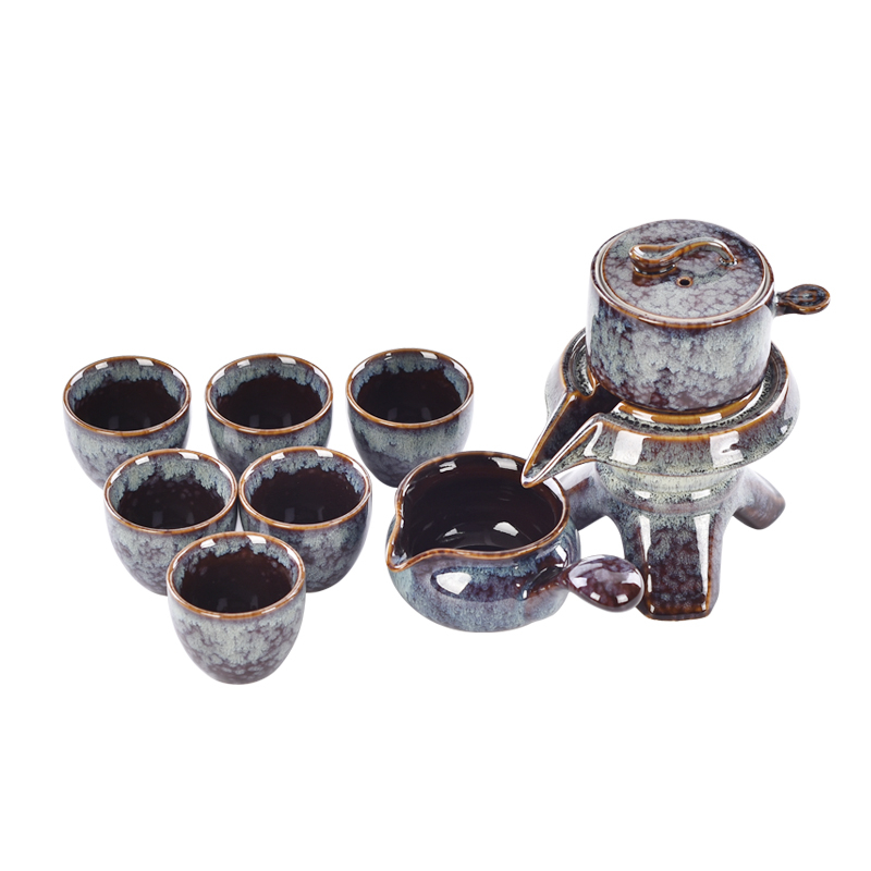 Empresas de producción Venta directa Juego de té de cerámica rotatorio creativo Té de preparación automática